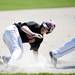 Milan sophomore Thomas Lindeman is called out sliding into third base during the game against Richmond on Friday, June 14. Daniel Brenner I AnnArbor.com
